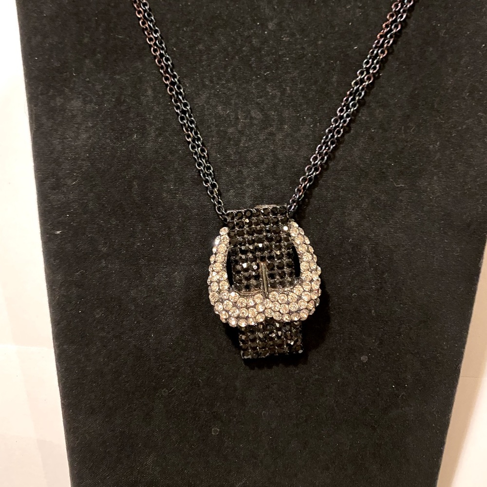 NWOT. Fun Sparkly Buckle Necklace. Features upside down sparkle heart